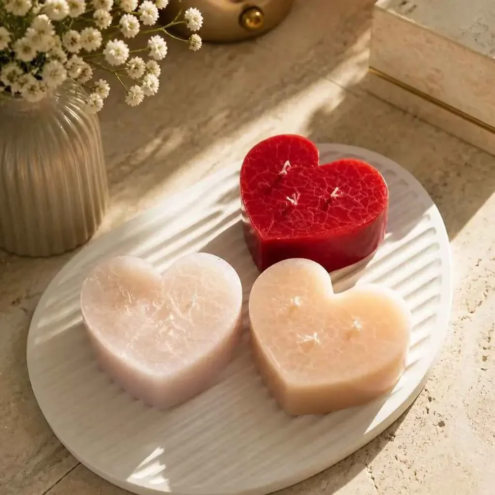 Large heart shaped scented candles. $10.00 each